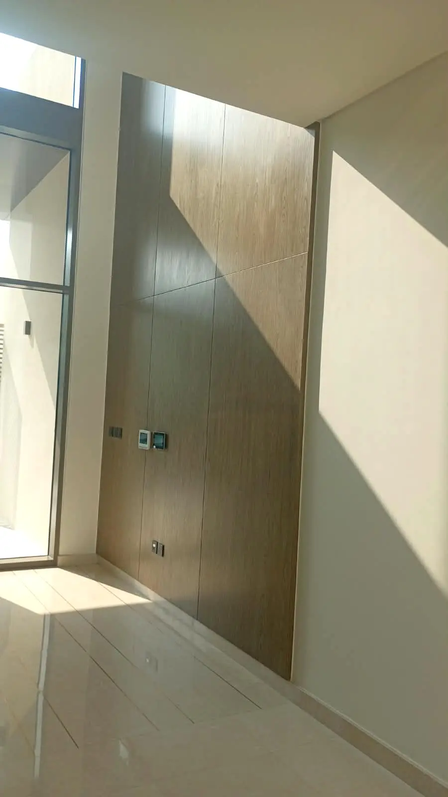 Timber wall cladding panels at double height