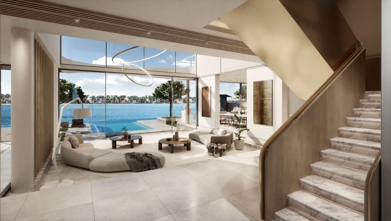 Waterfront villa living space at Palm Jabal Ali with a marble-tread staircase rising to the upper floor