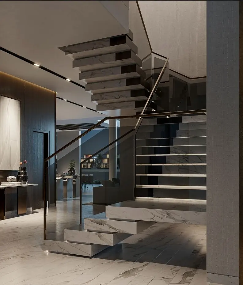 Floating stone staircase with cantilevered marble treads and a frameless glass balustrade